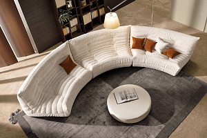 Полукруглый бескаркасный диван ДеФранс в гостиной